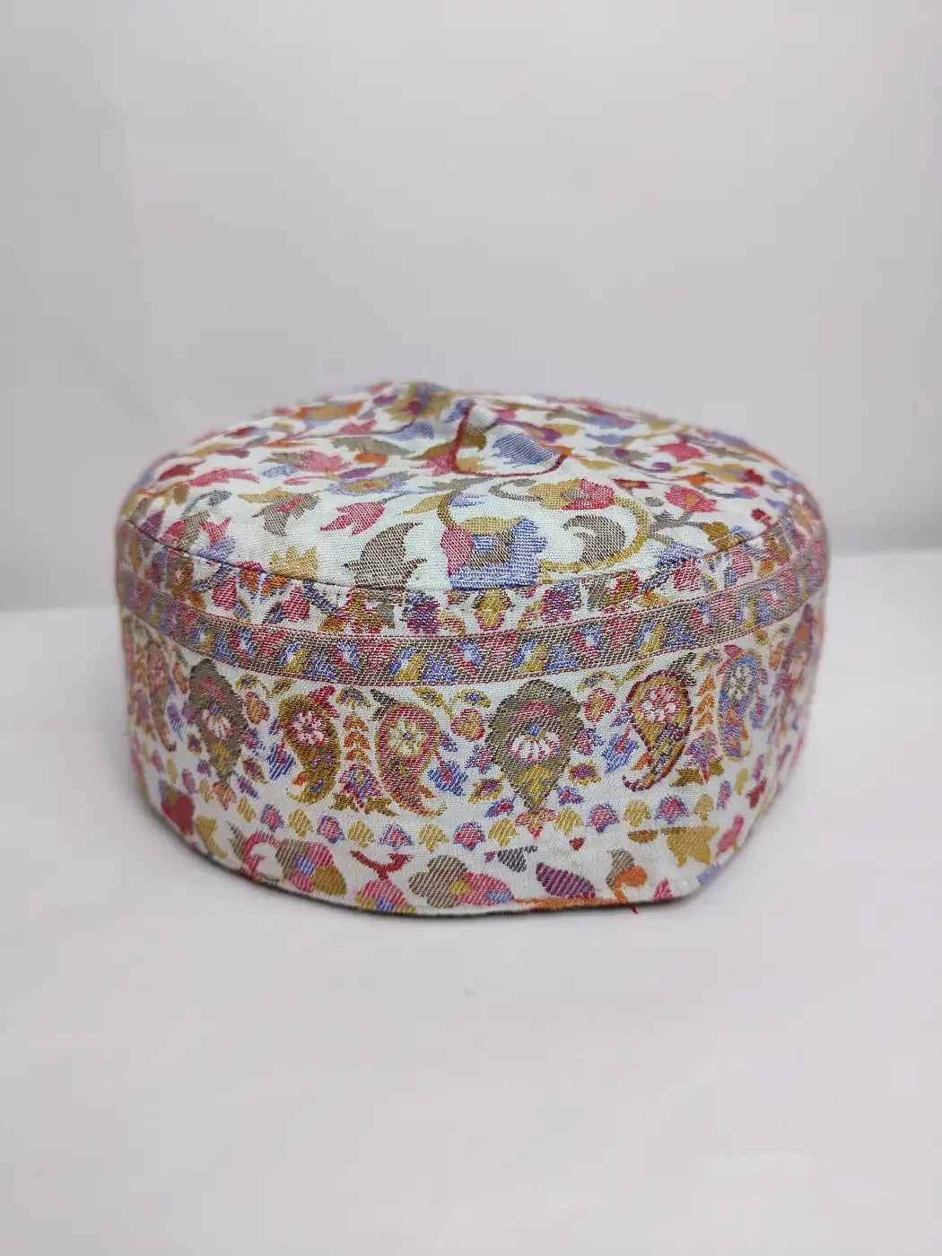 Kashmiri cap in white with continuous kani badam and floral patterns