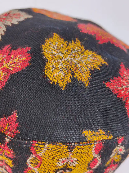 kani unique cap in black with woven chinari pattern