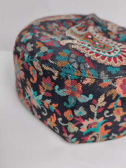 black cap from Kashmir in floral motifs 