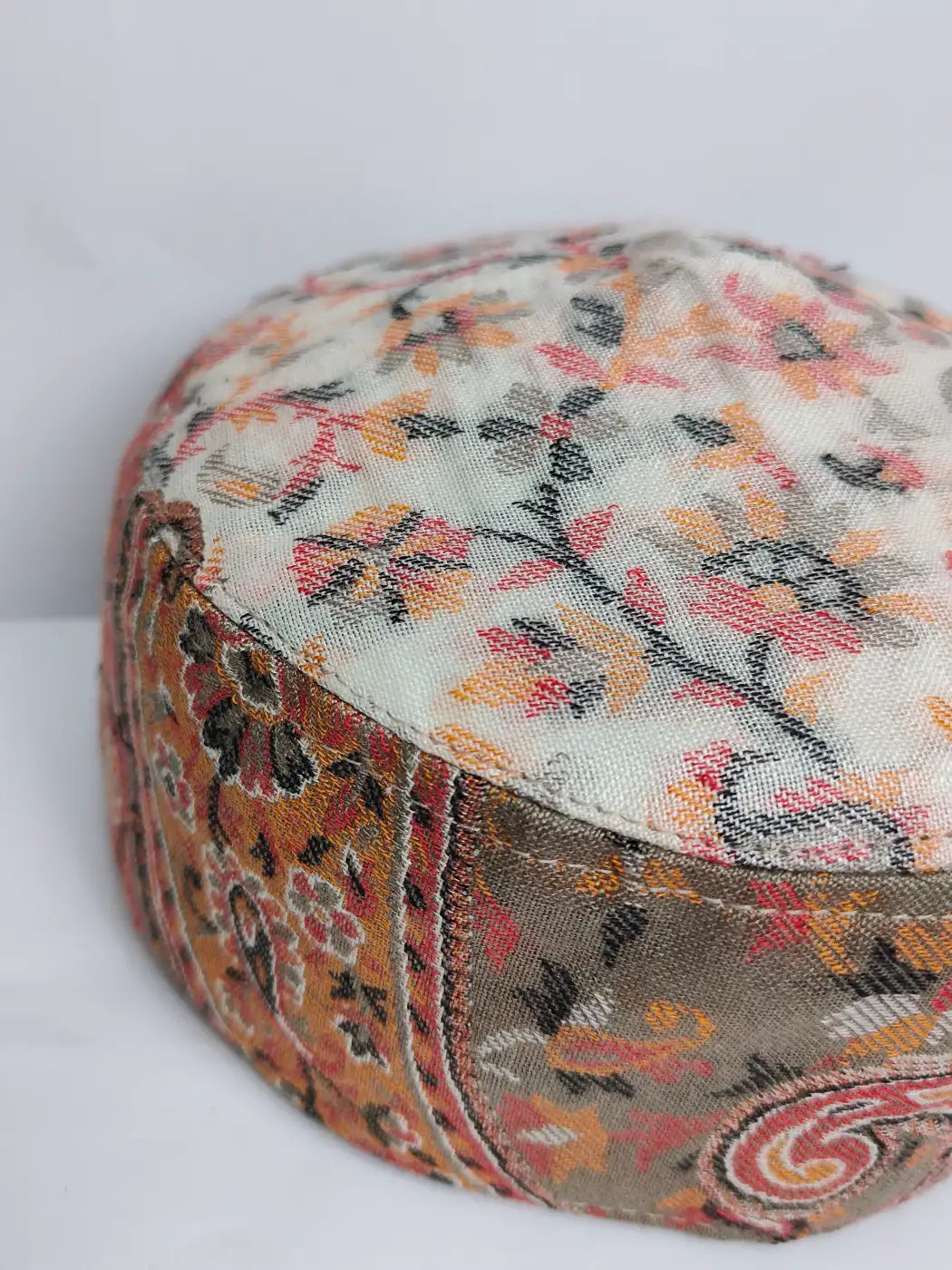 round Kashmiri kani cap in floral pattern 