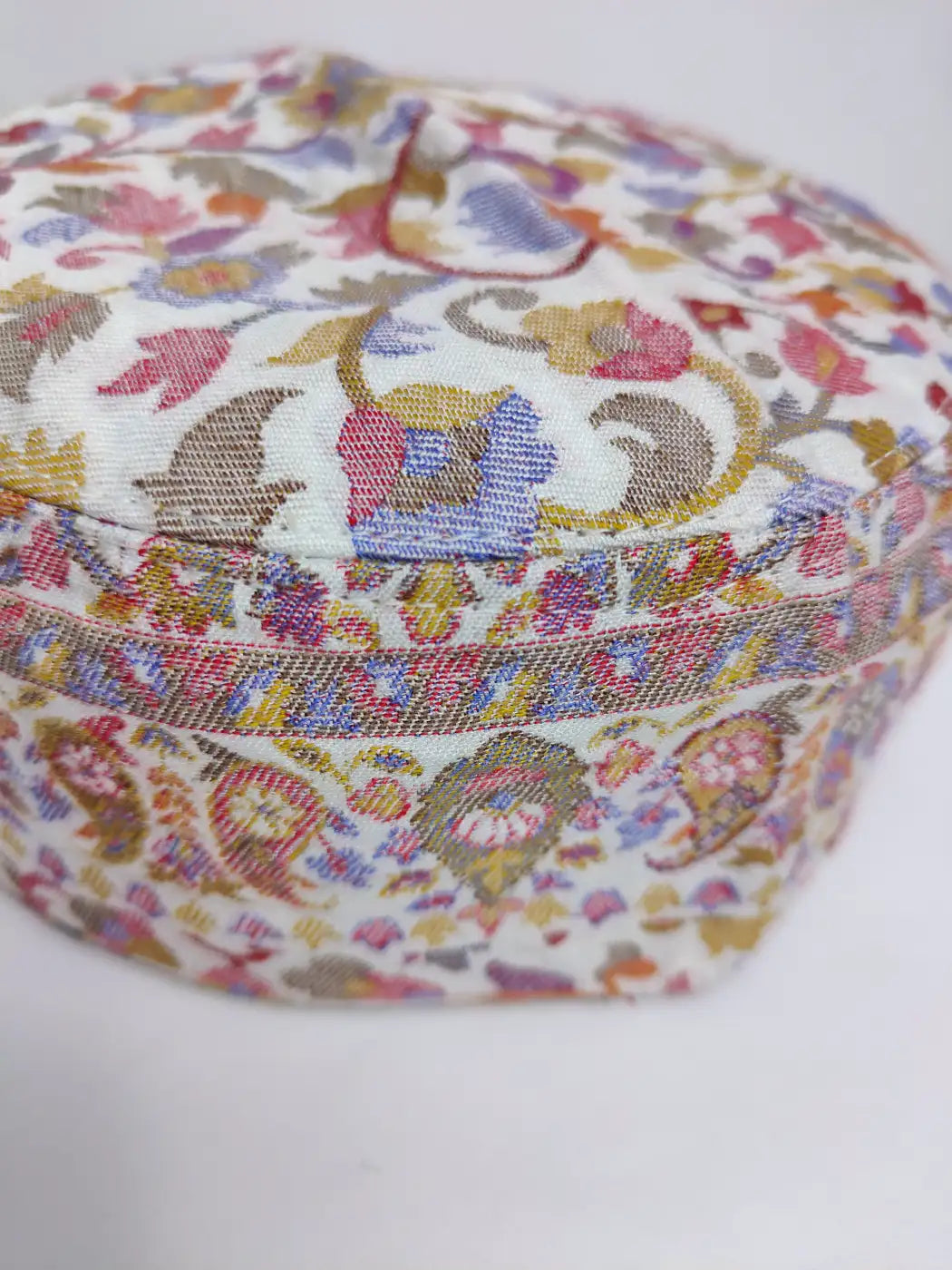 white cap in kani patterns
