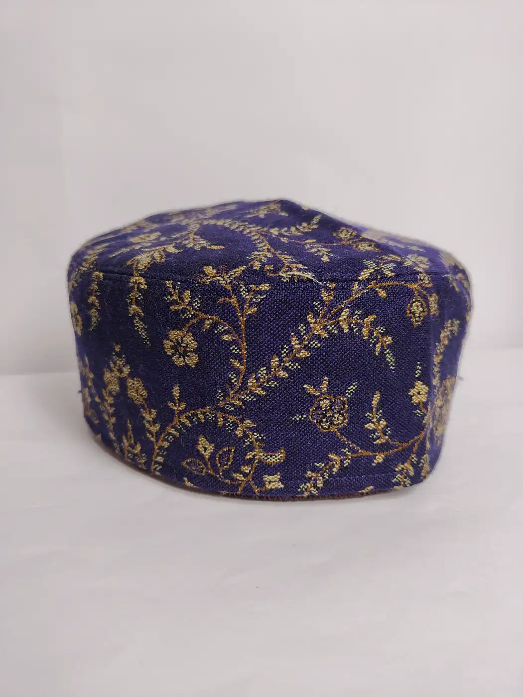 dark blue Kashmiri kani traditional cap with floral vine pattern