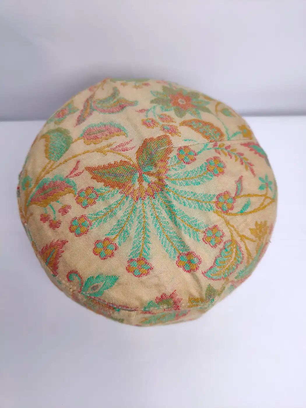 Kashmiri beige cap in florals on top side