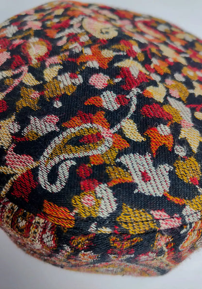 black cap with floral embroidery in kani 