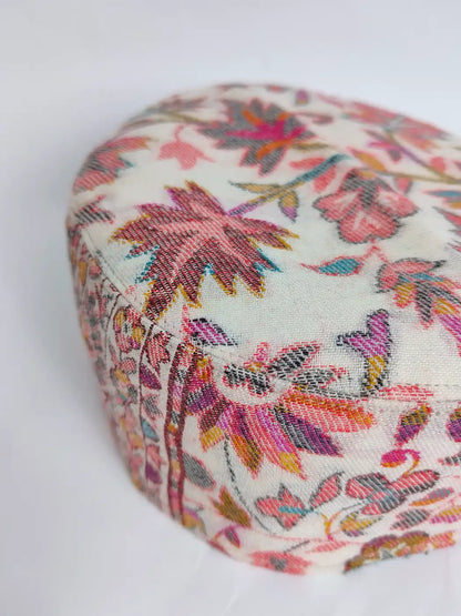white cap from Kashmir with florals