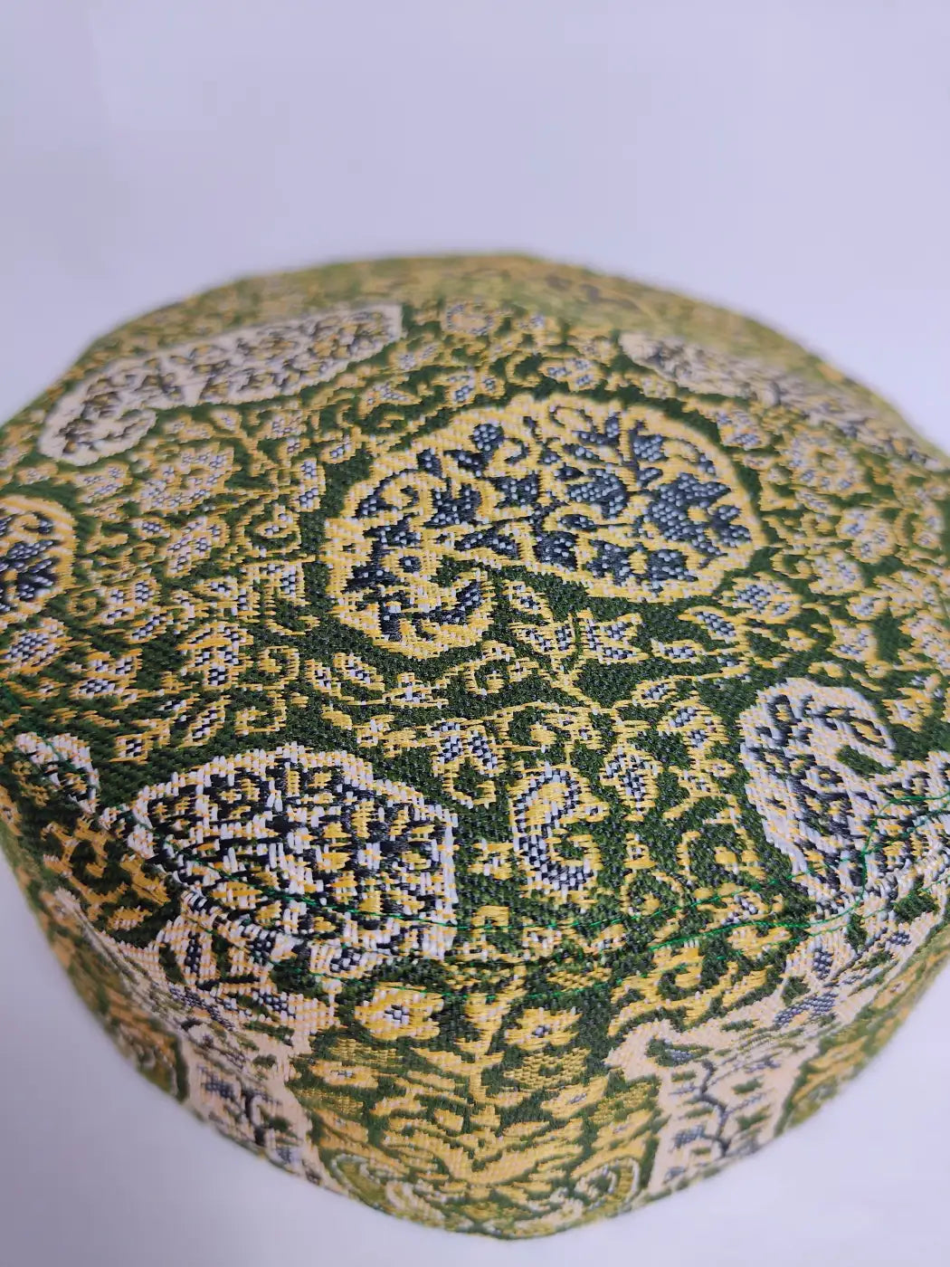 green kani cap with badam motifs