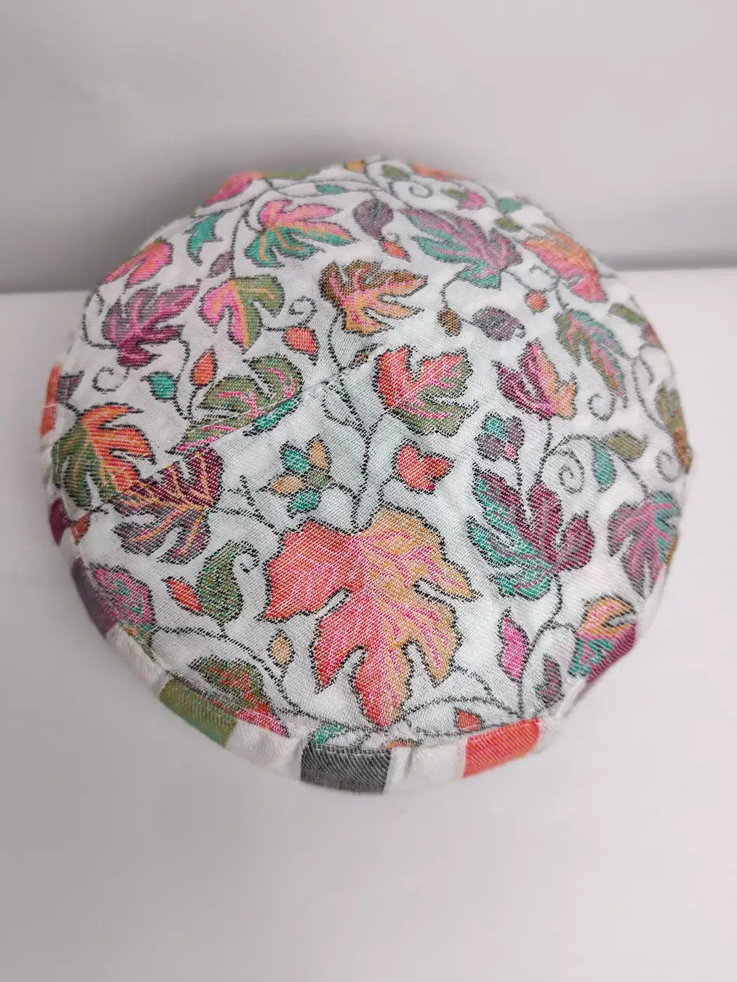 Kashmiri white cap top side in kani chinar and floral pattern on top side