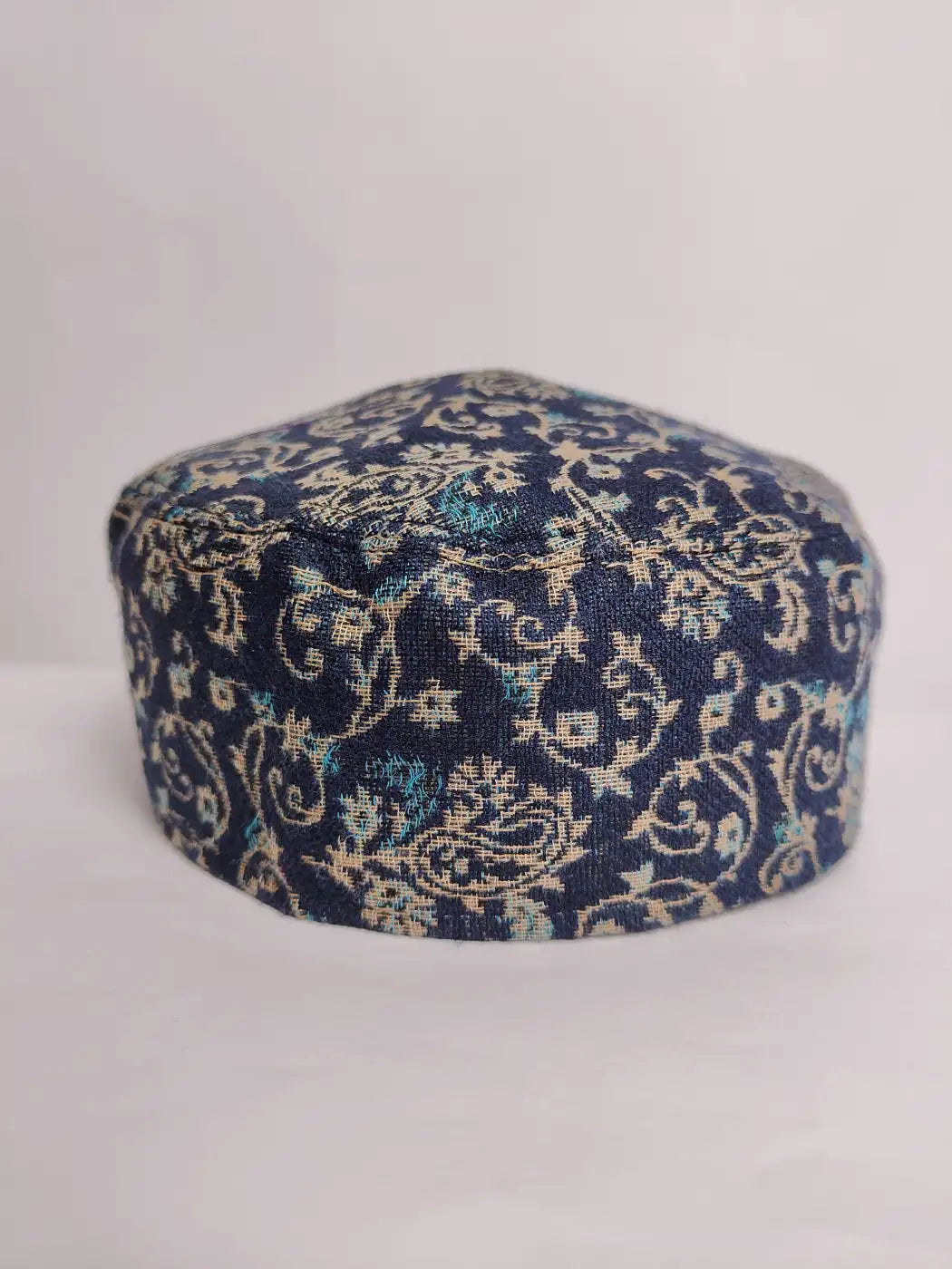 black kani round cap with vine patterns