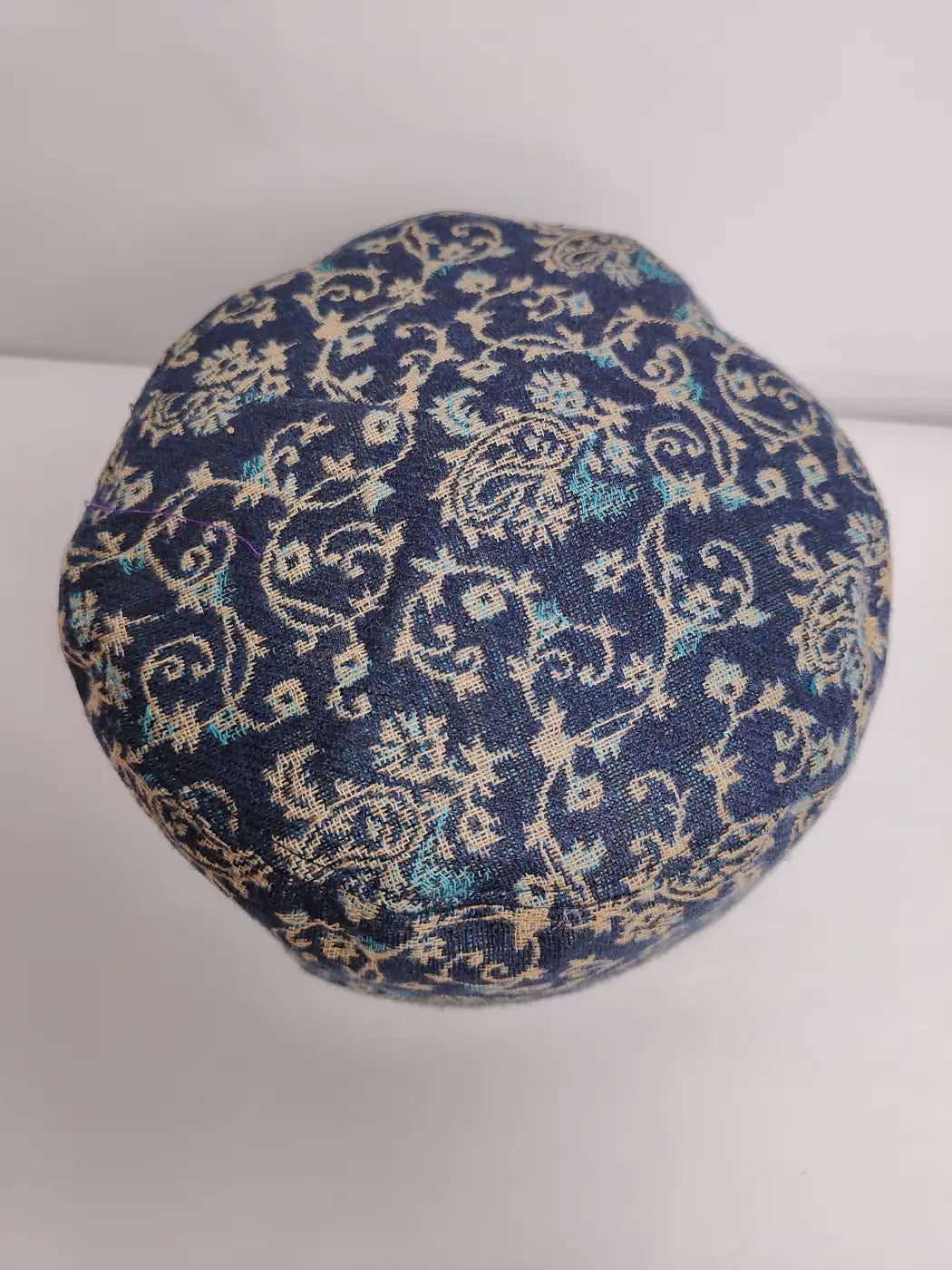 dark blue kani cap from kashmir with vine pattern 