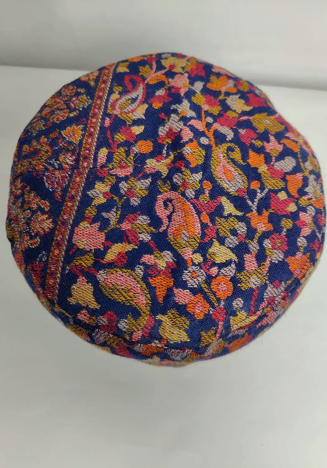dark blue kani cap top side with kani floral work