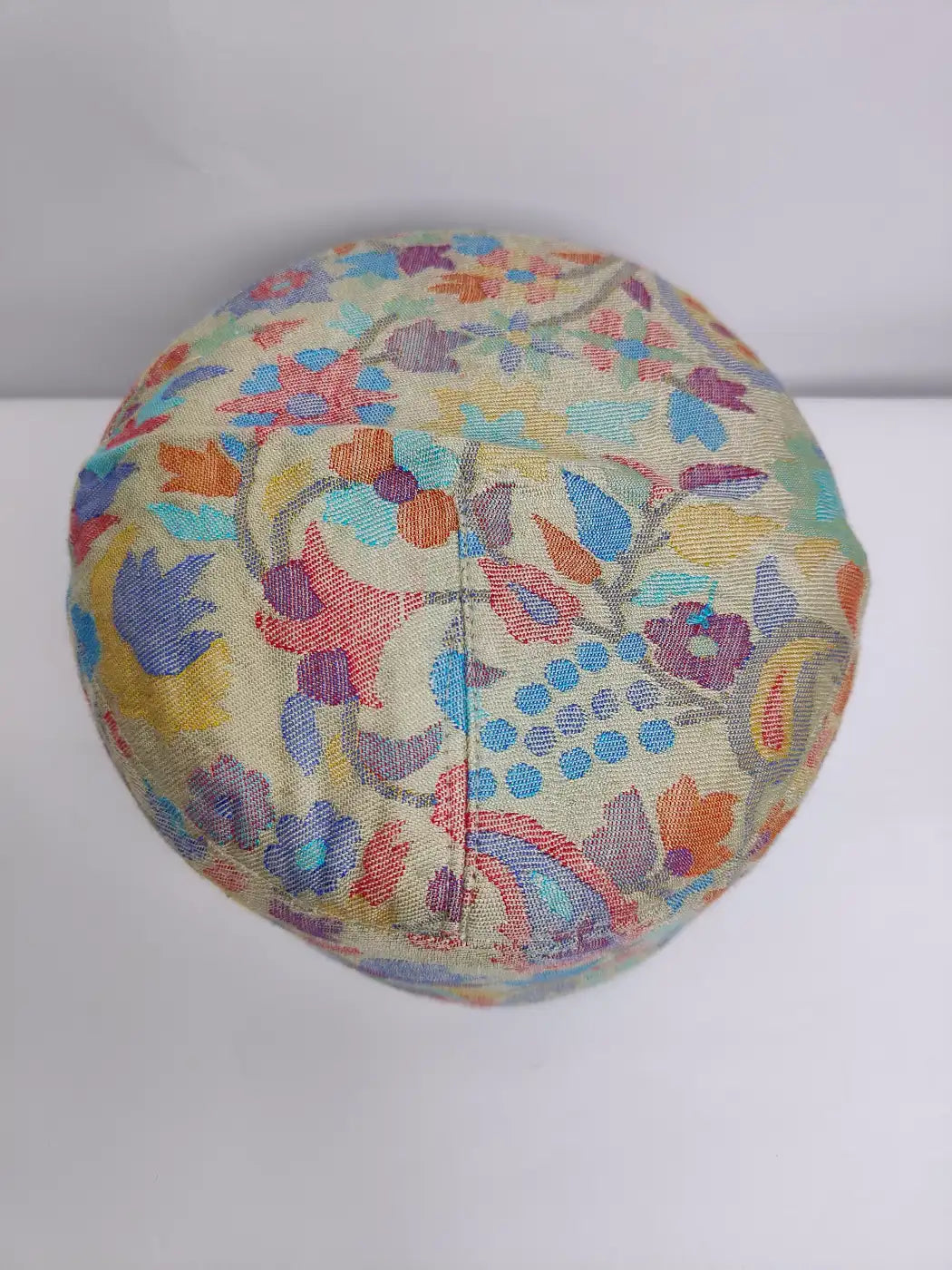 kashmiri cap top side in kani woven florals