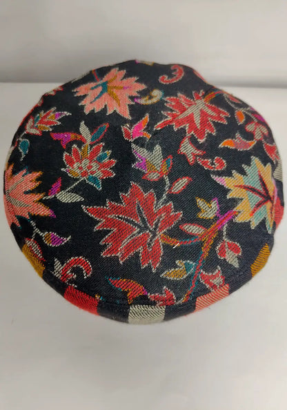 kani chinari pattern on the top side of the black Kashmiri kani cap