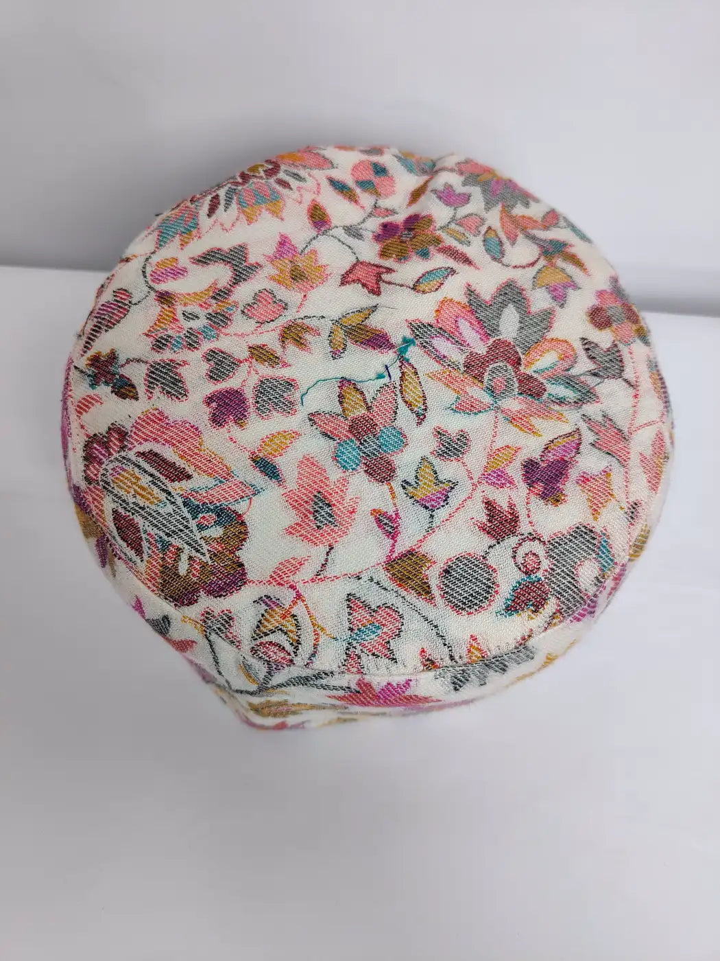 white kani topi top side in floral pattern 