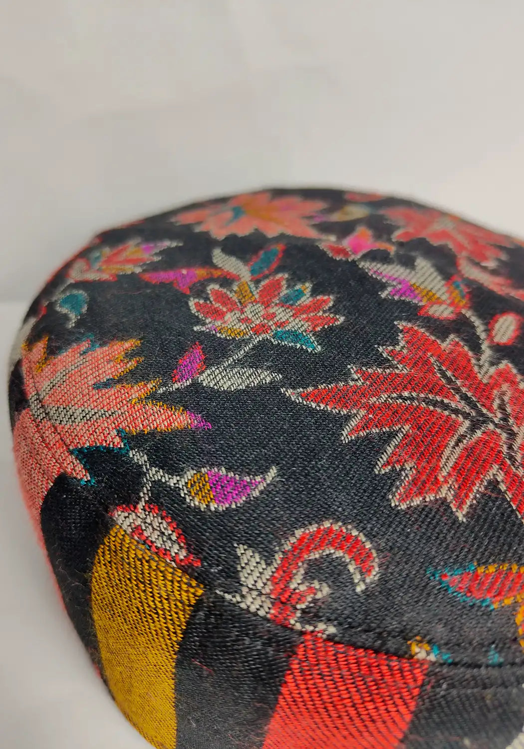chinari pattern on top side and strips at border of the black colour Kashmiri stylish kani cap
