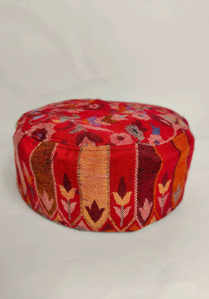 lakeer lattern on the sides of red kashmiri kani cap