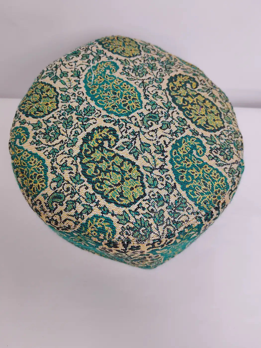 round kani cap top side in green with badam patterns