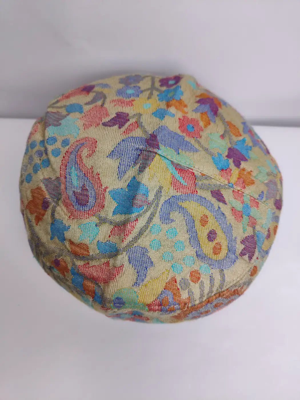 Kashmiri traditional cap in beige with floral and badam in woven patterns