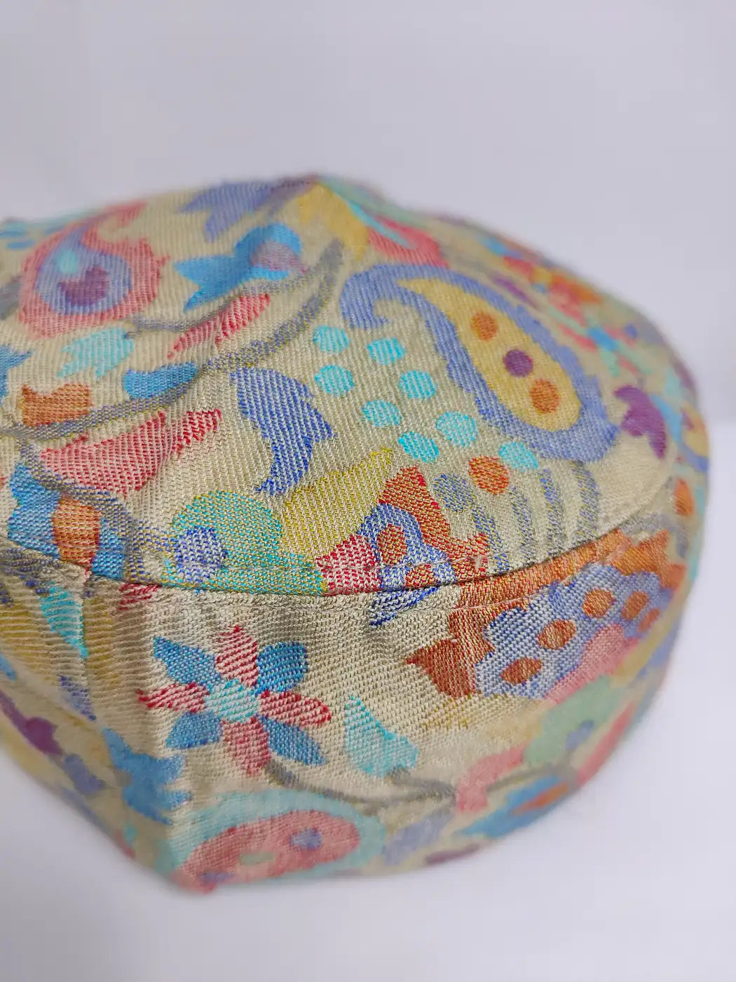 Beige Kashmiri cap in florals woven in kani style