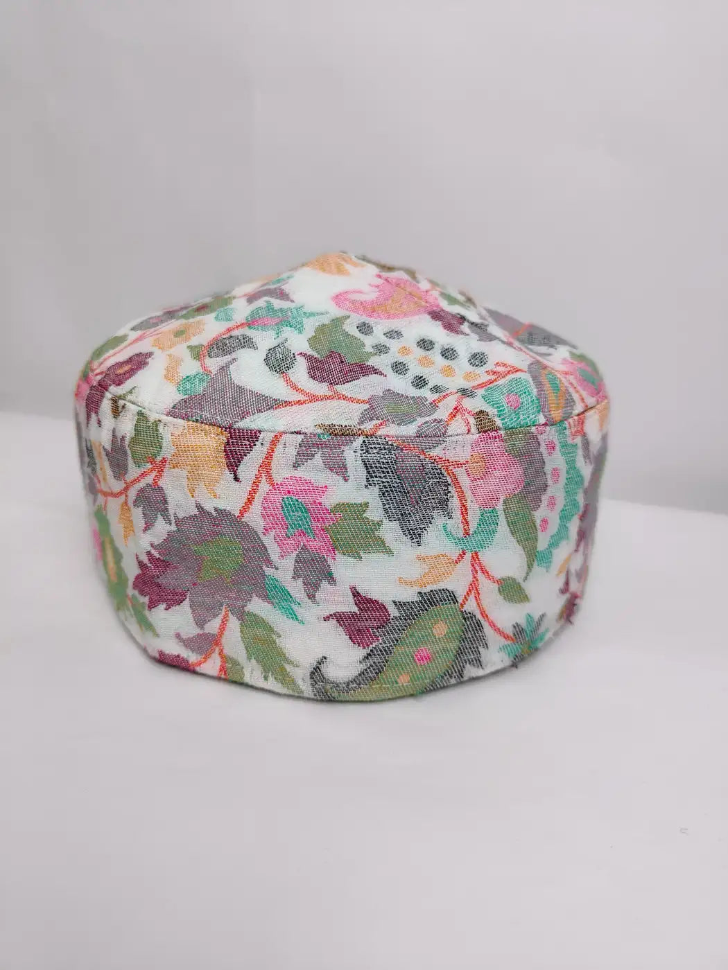white cap in florals kani woven from Kashmir
