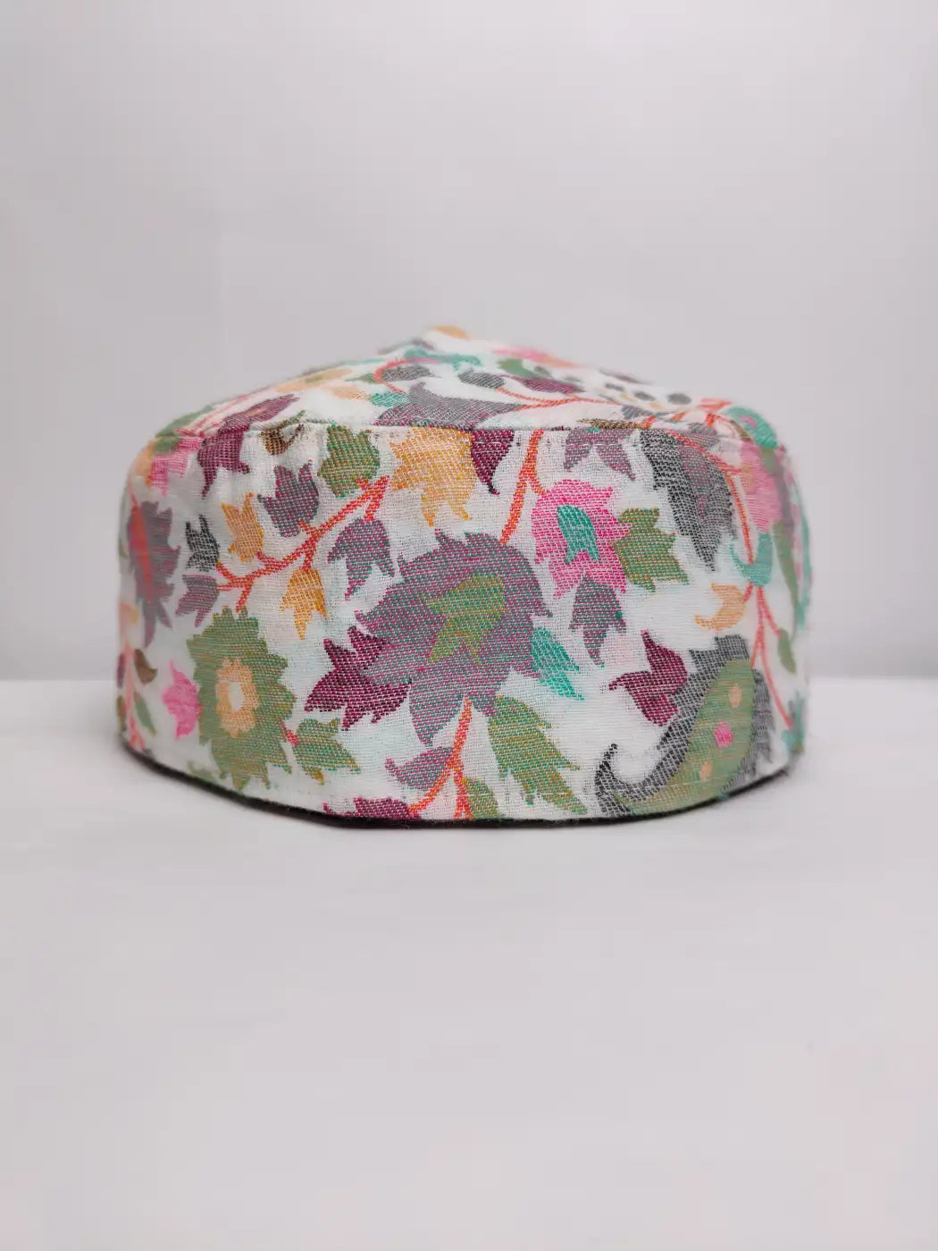 white Kashmiri cap in florals
