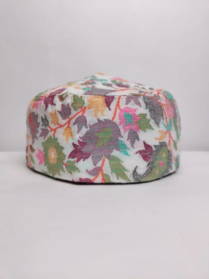 white Kashmiri cap in florals