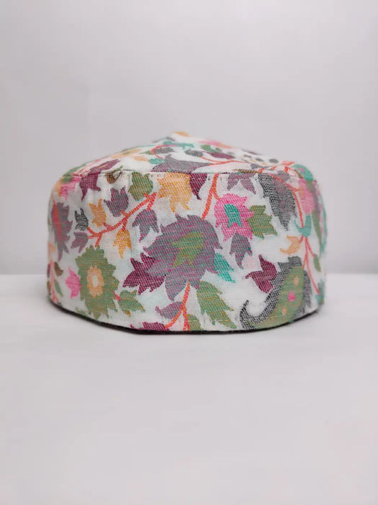 white Kashmiri cap in florals