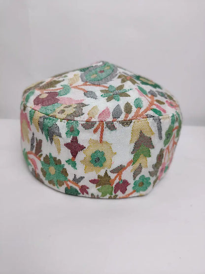 white topi with kani woven florals