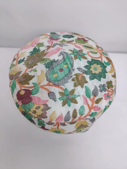 round Kashmiri cap with woven kani florals on top side