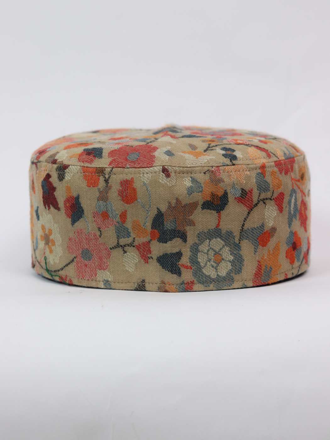 round Kashmiri cap in woven pattern 