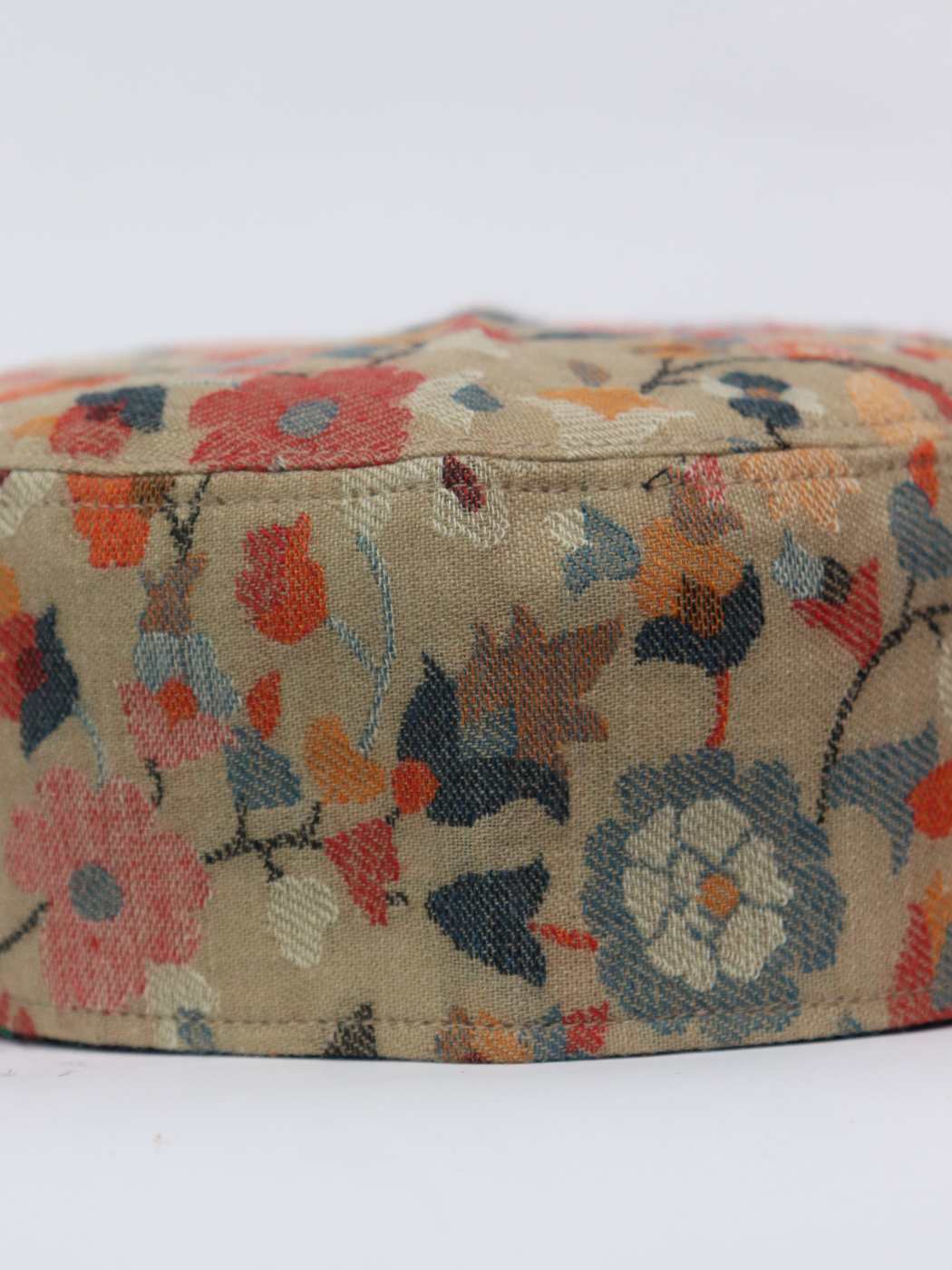 Kashmiri cap in kani shawl with floral woven motifs