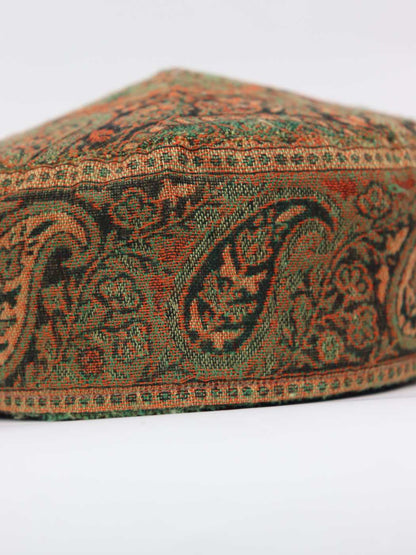 black cap frim Kashmir in kani shawl fabric 