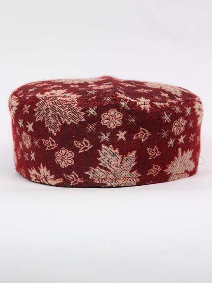 red fabric cap in floral woven pattern