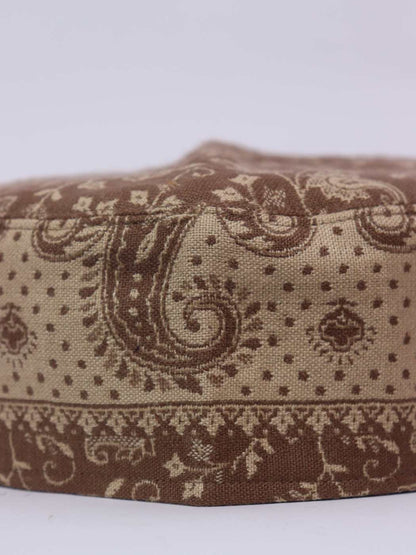 brown cap in floral motifs 