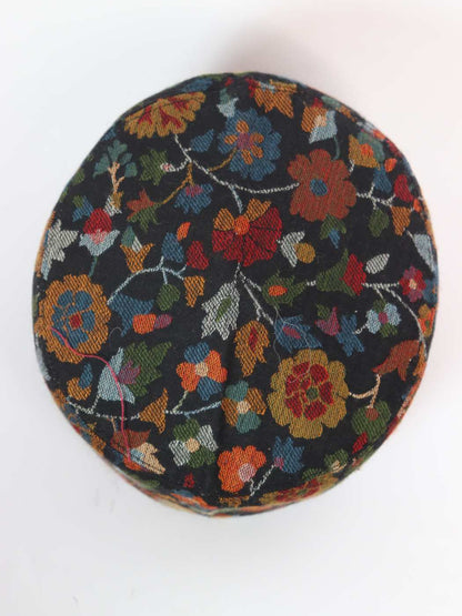 black cap top side in woven floral motifs