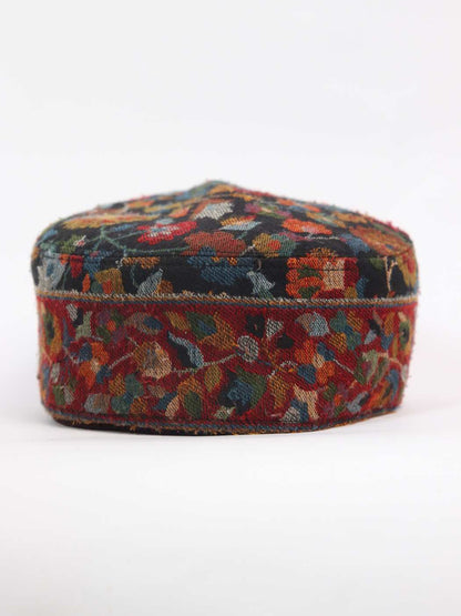 kani cap in black with floral woven pattern 