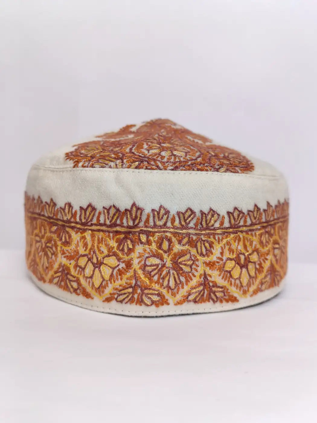cream colour topi with hand sozni work 
