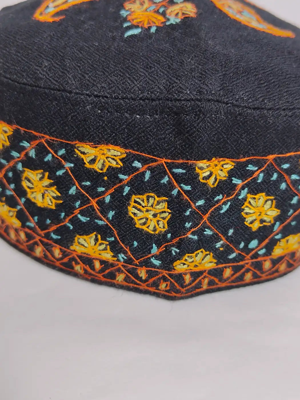 geometrical pattern embroidery on side