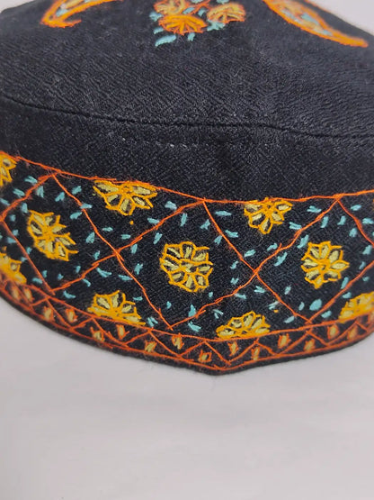 geometrical pattern embroidery on side