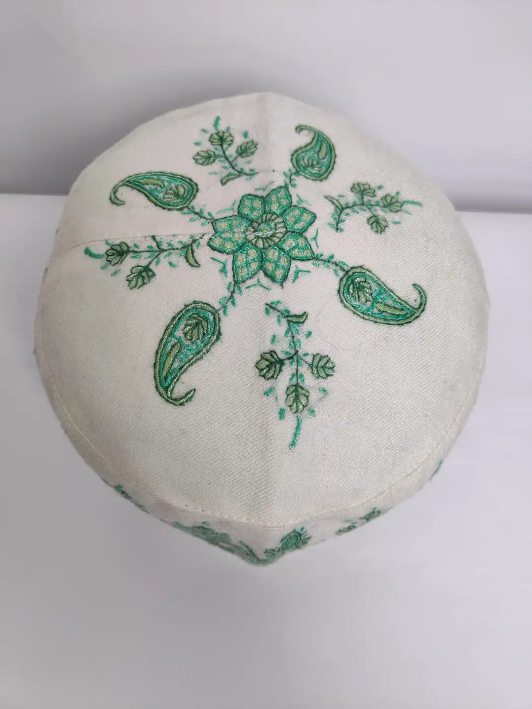Kashmiri topi in cream colour with hand sozni embroidery on top side