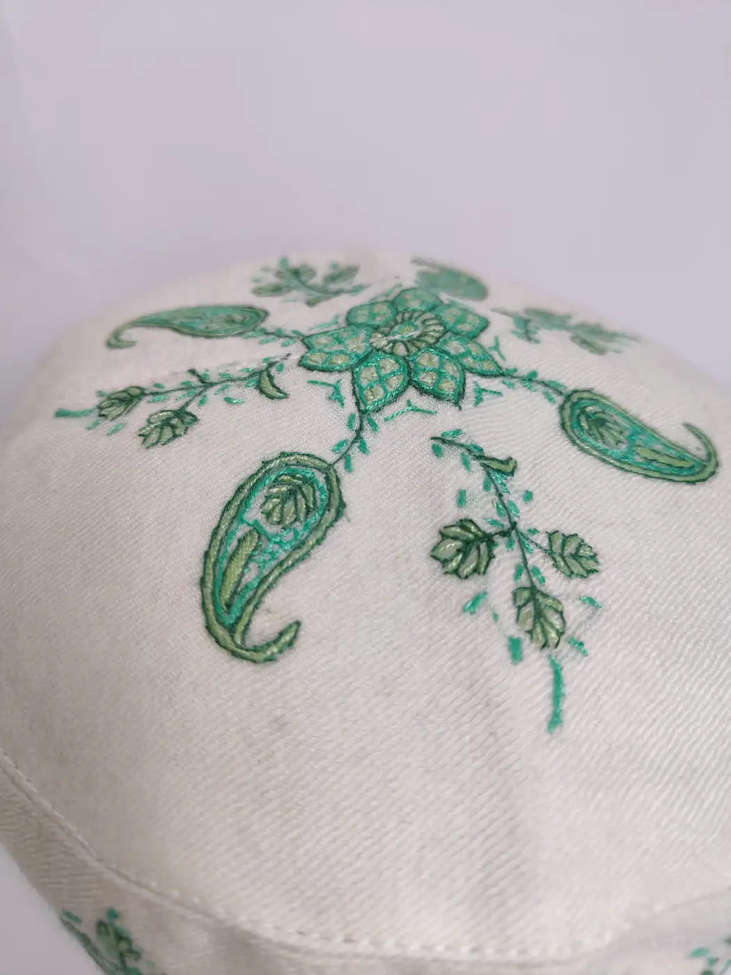 cream cap from Kashmir with sozni embroidery