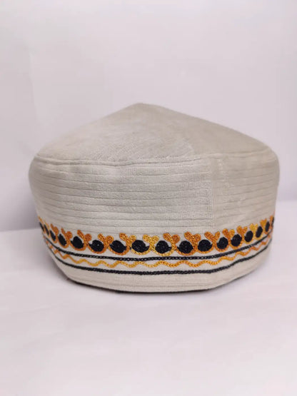 velvet cap from Kashmir with aari work across sides