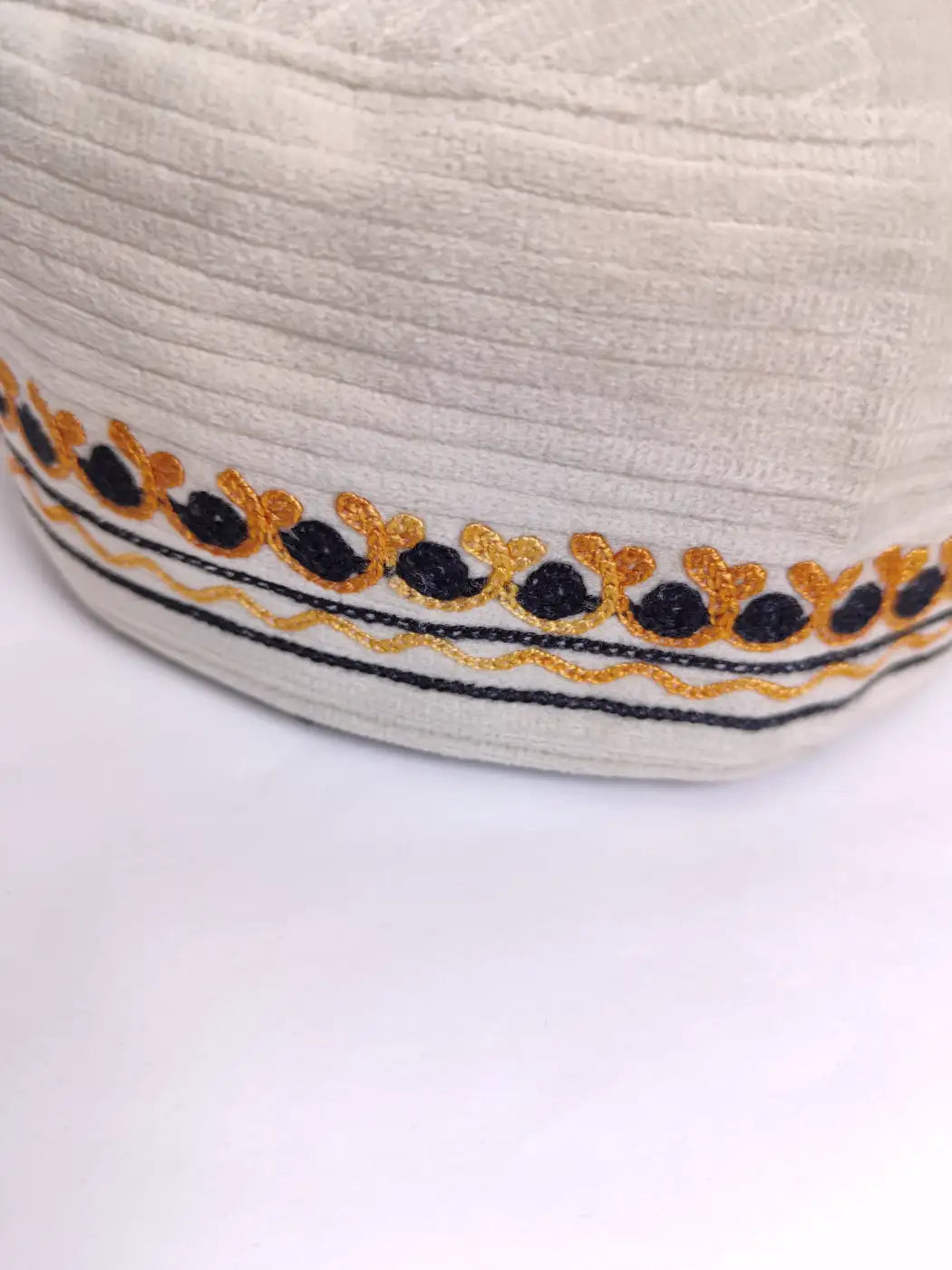 white Kashmiri cap in aari embroidery 
