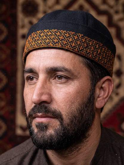 Kashmiri cap in black with sozni embroidery across border