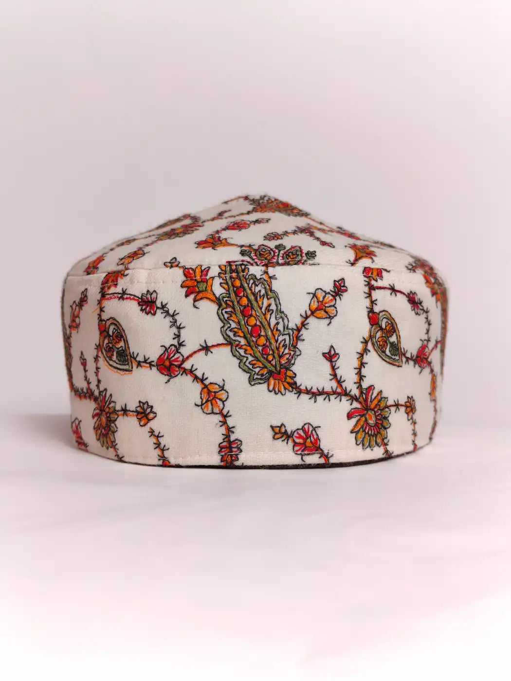 white cap with sozni pattern 