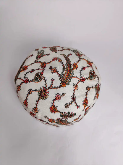 white cap from Kashmir with sozni embroidery on top side 