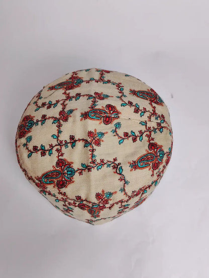 topi with Sozni embroidery on the top side 