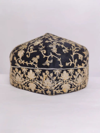Designer cap with zari work on top side and border