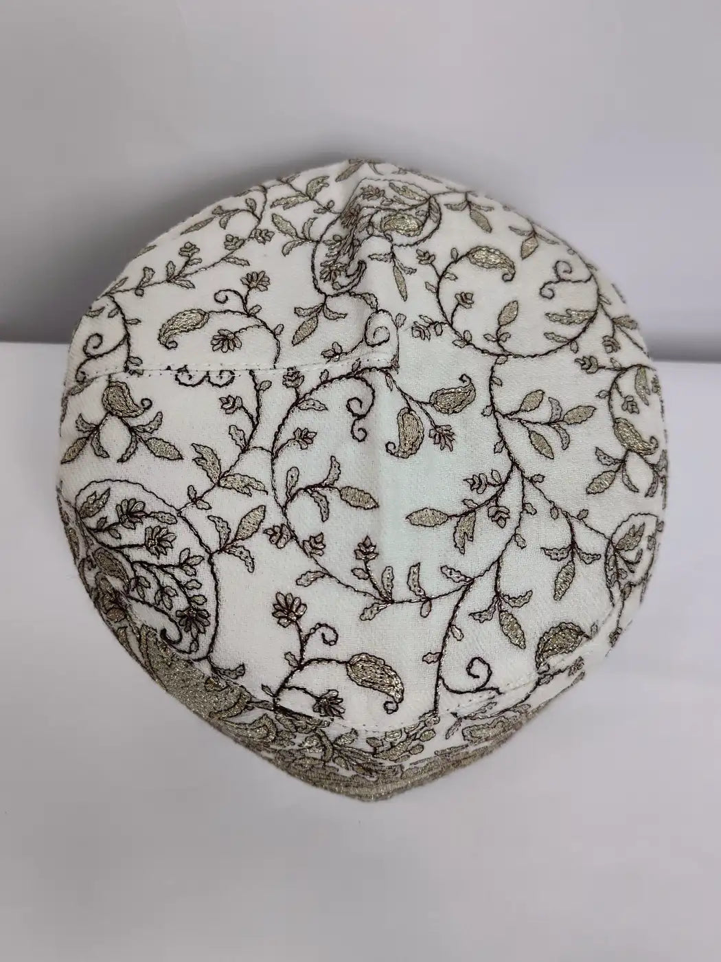 white cap top side in zari floral vine work