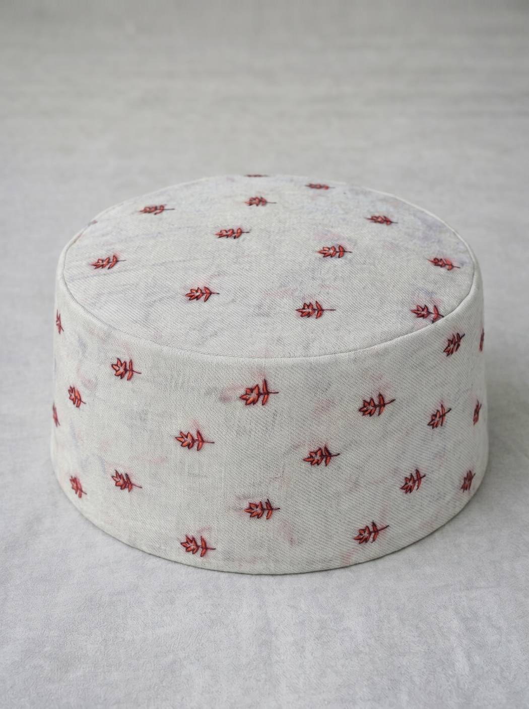 White topi with all over booti style sozni florals