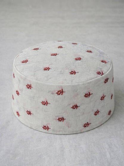 White topi with all over booti style sozni florals